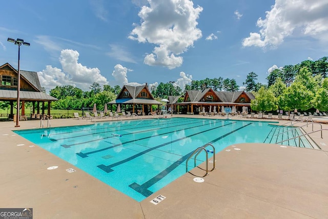 view of pool featuring a patio