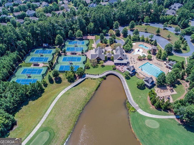 birds eye view of property featuring a water view