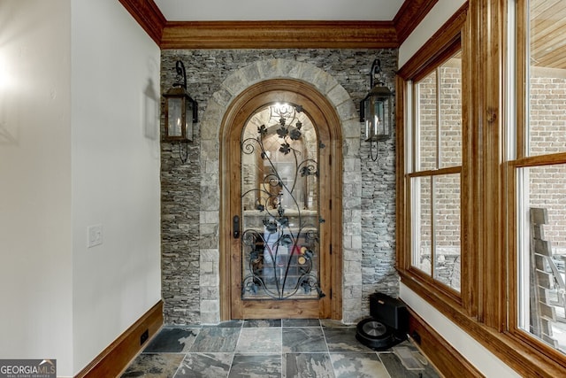 wine room featuring crown molding