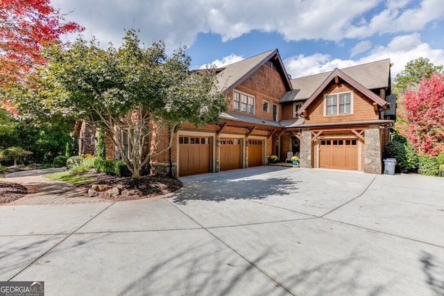 craftsman inspired home with a garage