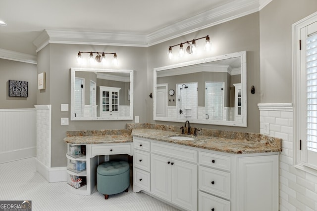 bathroom featuring vanity, ornamental molding, and tile patterned floors