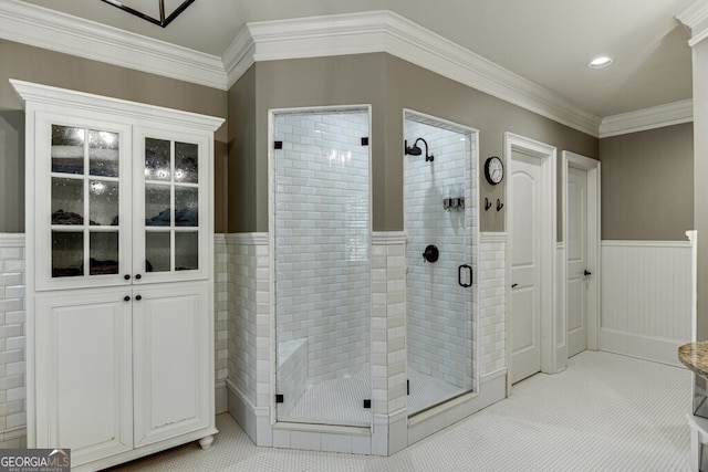 bathroom with walk in shower, ornamental molding, and tile patterned floors