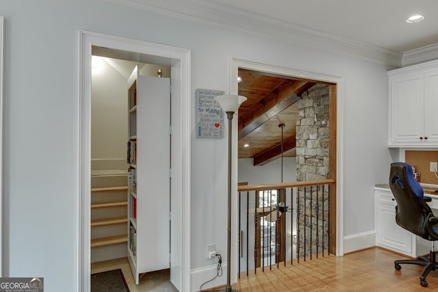 office space with beam ceiling, wood ceiling, and crown molding