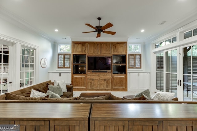 living room featuring crown molding, ceiling fan, and french doors