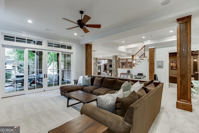 living room with french doors, light colored carpet, ornamental molding, and ceiling fan