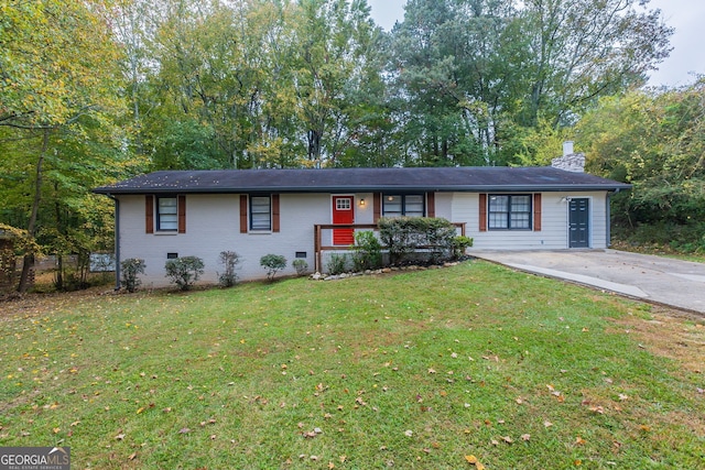 ranch-style house with a front yard