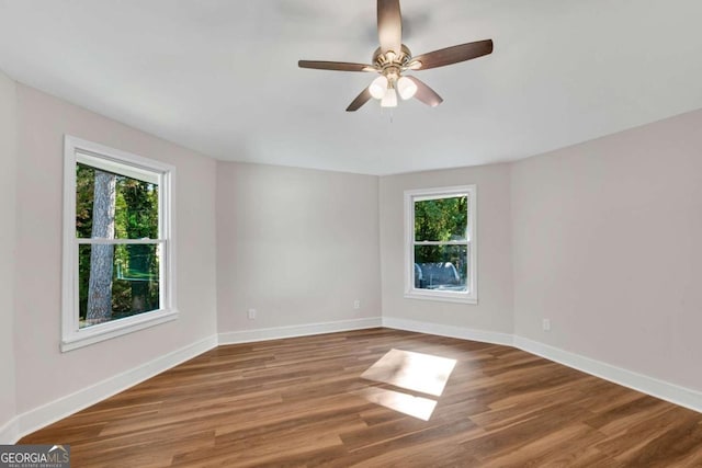 unfurnished room featuring wood-type flooring and ceiling fan