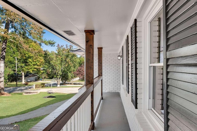 balcony featuring covered porch