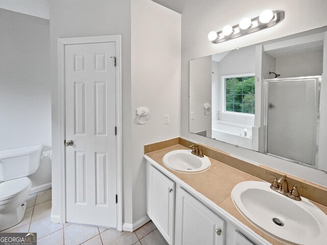 bathroom featuring vanity, shower / tub combination, and tile patterned floors