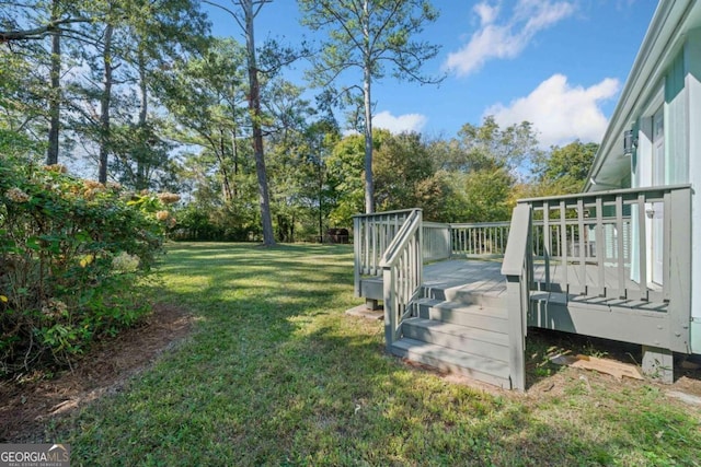 view of yard with a deck