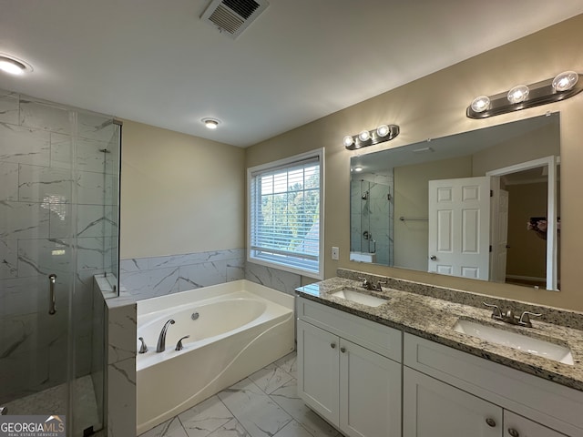 bathroom with vanity and plus walk in shower