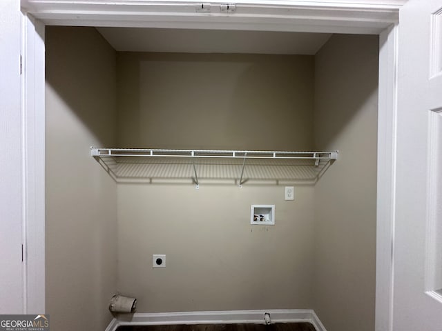 laundry room with hookup for an electric dryer and hookup for a washing machine