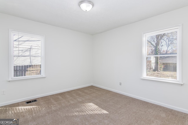 view of carpeted spare room