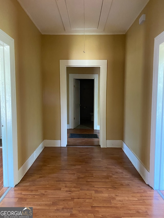 corridor featuring light hardwood / wood-style flooring