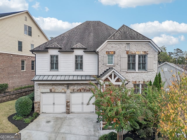 view of front of property featuring a garage