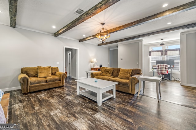 living room with beamed ceiling, an inviting chandelier, dark hardwood / wood-style floors, and a textured ceiling