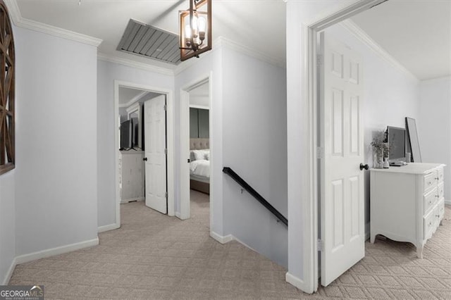 corridor featuring light carpet and crown molding