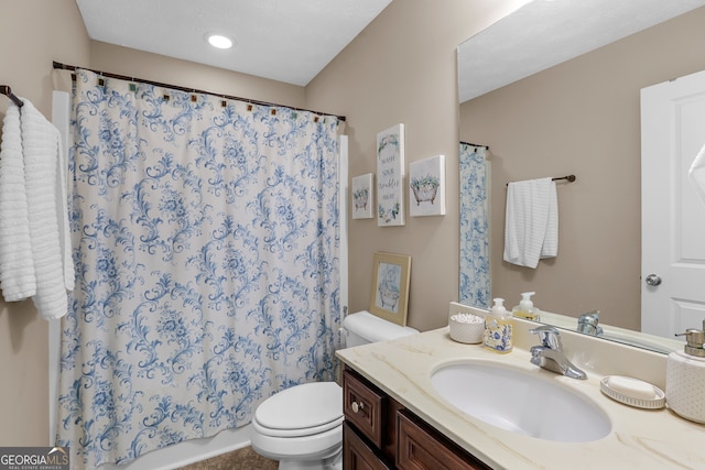 full bathroom with vanity, toilet, and shower / tub combo with curtain