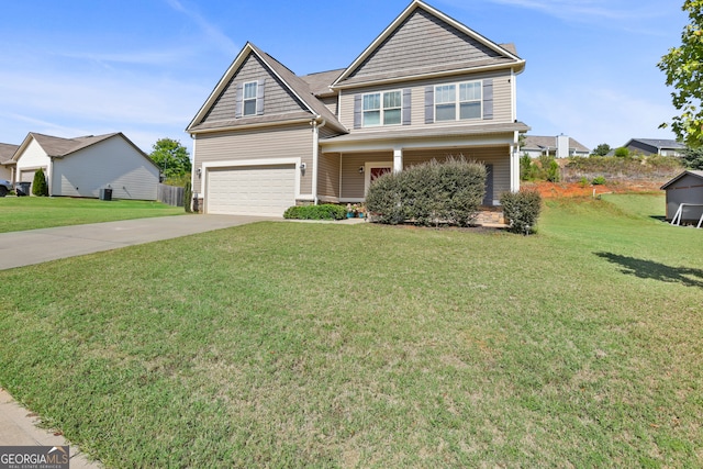 view of front facade featuring a front lawn and a garage