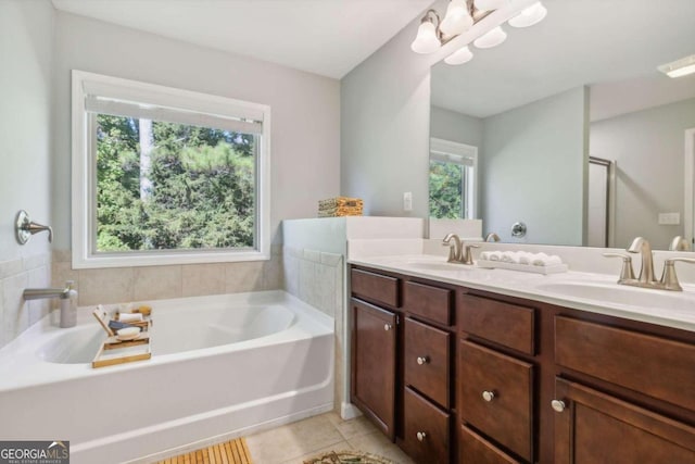 bathroom featuring tile patterned flooring, vanity, and independent shower and bath