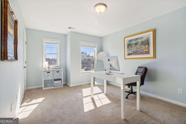 office space featuring light colored carpet