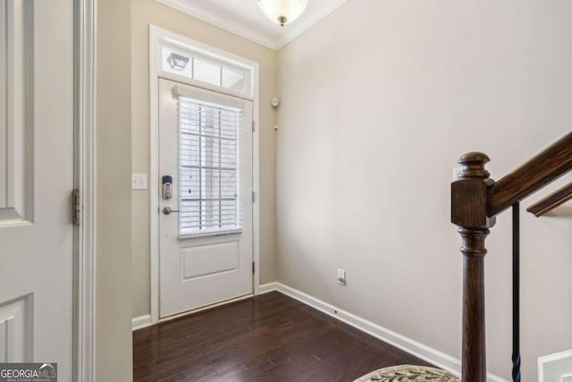 entryway with dark wood-type flooring and ornamental molding