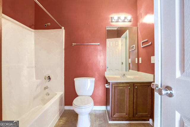 full bathroom with toilet, vanity, tile patterned floors, and tub / shower combination