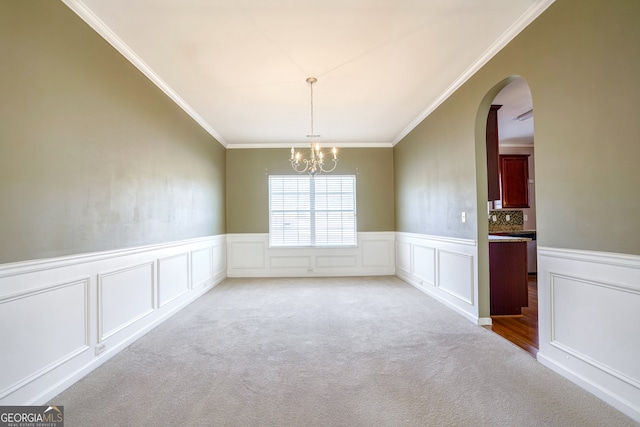 interior space featuring a notable chandelier and ornamental molding