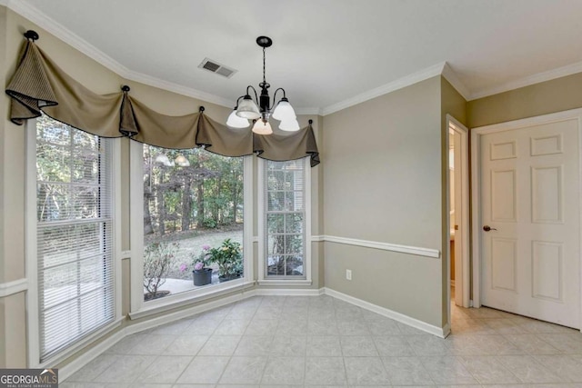 unfurnished dining area featuring a wealth of natural light, ornamental molding, and a chandelier