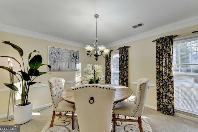 3034 Brookgreen Trl, Lawrenceville, GA 30043 - dining space with visible vents, crown molding, a healthy amount of sunlight, light colored carpet, and a notable chandelier