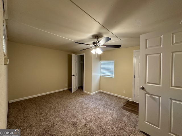 unfurnished bedroom with carpet flooring and ceiling fan