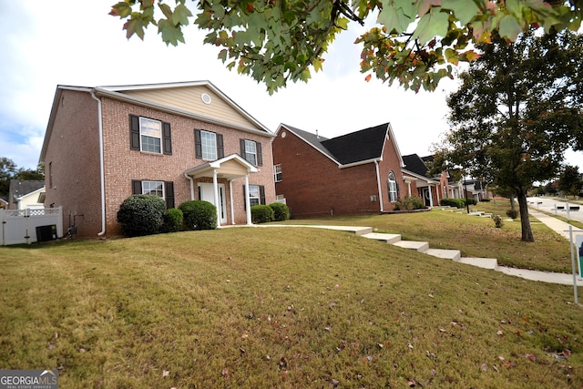 front facade featuring a front lawn