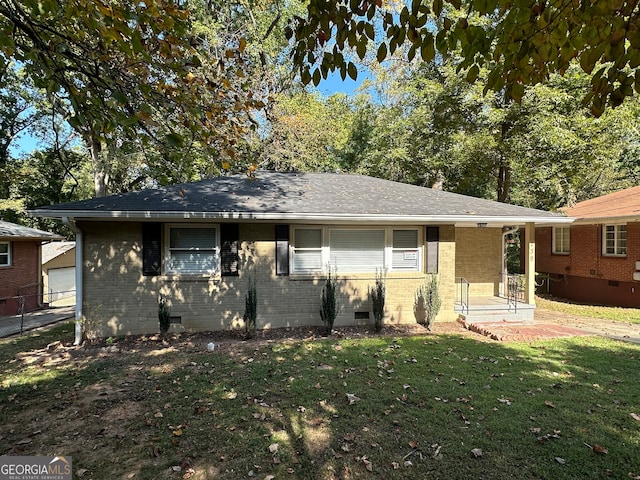 ranch-style home with a front yard