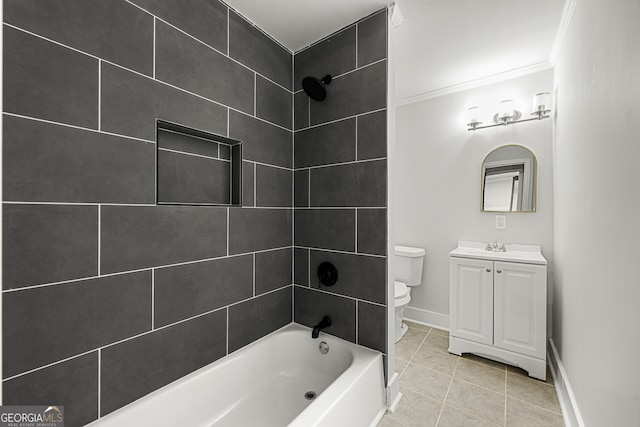 full bathroom with tile patterned floors, vanity, tiled shower / bath combo, crown molding, and toilet