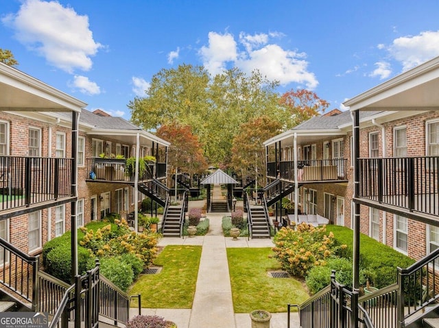 view of community featuring a yard