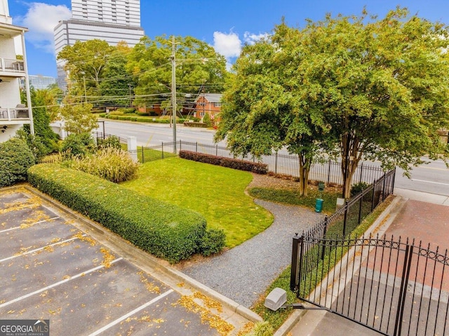 view of yard with a balcony