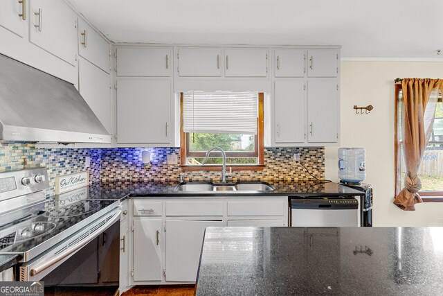 kitchen featuring stainless steel appliances, sink, and white cabinets