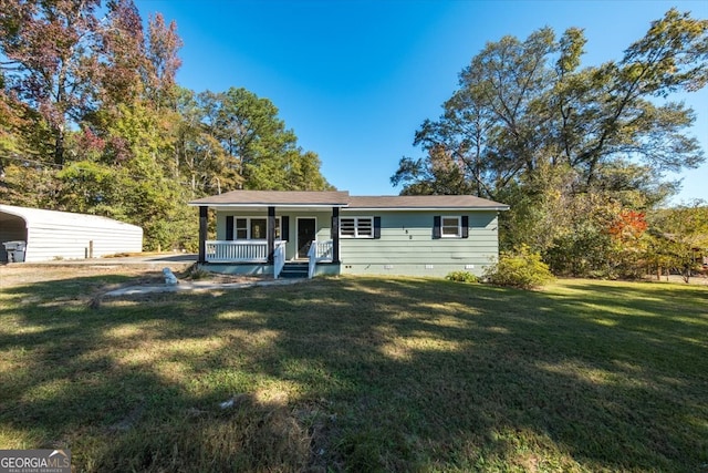 view of front of house with a porch and a front lawn