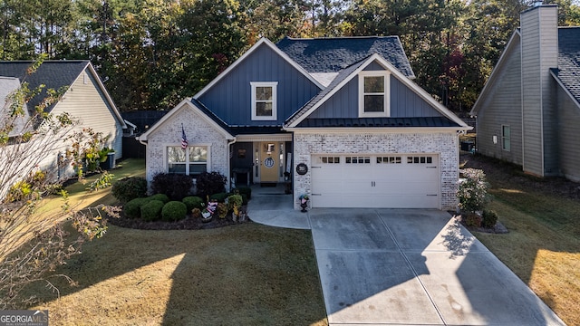 craftsman house featuring a garage and a front lawn