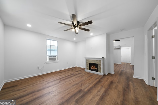 382 N Fifth St, Cedartown, GA 30125 - unfurnished living room featuring ceiling fan, dark wood-style flooring, cooling unit, a stone fireplace, and recessed lighting