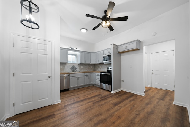 382 N Fifth St, Cedartown, GA 30125 - kitchen with appliances with stainless steel finishes, ceiling fan, dark wood-style floors, backsplash, and gray cabinetry