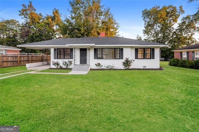 ranch-style home with a front yard