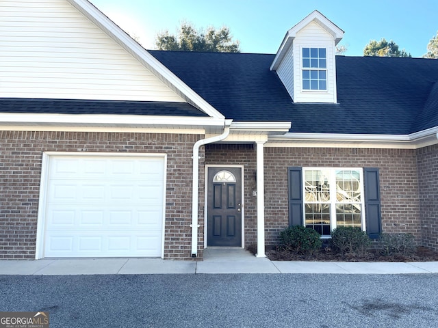 property entrance featuring a garage