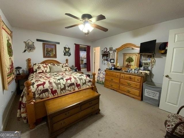 289 Cypress Cir, Ellijay, GA 30540 - bedroom featuring light carpet and a ceiling fan