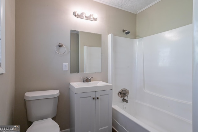 6230 Kensington Ct, Austell, GA 30106 - bathroom featuring toilet, vanity, bathtub / shower combination, a textured ceiling, and crown molding