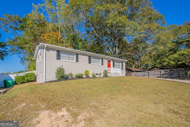 view of front of home with a front yard