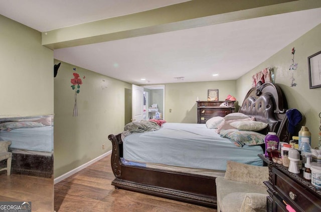 bedroom featuring hardwood / wood-style floors