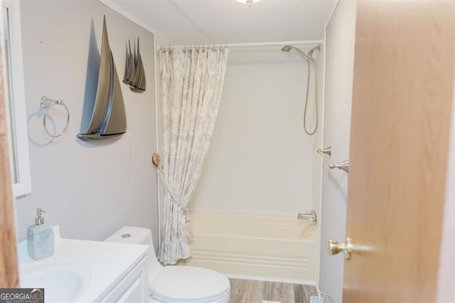 full bathroom with vanity, hardwood / wood-style floors, shower / bath combination with curtain, and toilet