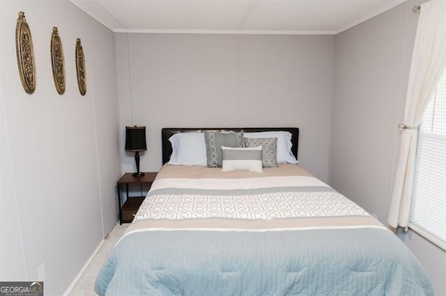 bedroom with crown molding