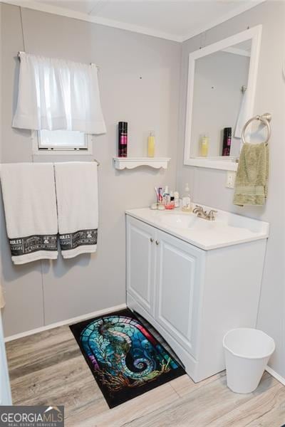 bathroom featuring vanity and hardwood / wood-style floors